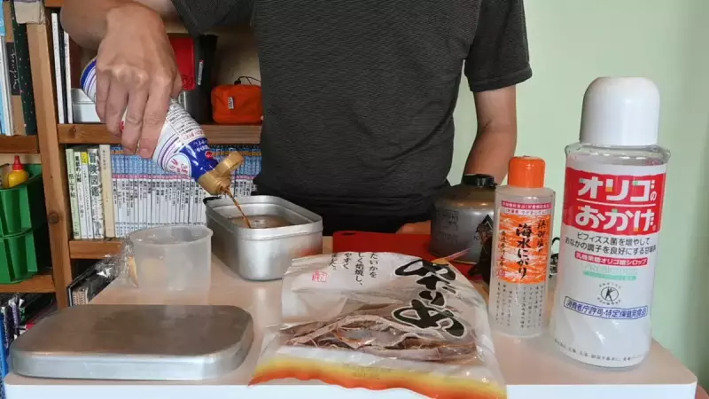 お米をお水、醤油、オリゴ糖を入れる